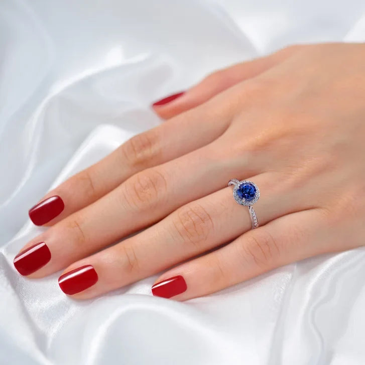 Round Cut Tanzanite and Diamond Ring (0.21 ctw)
