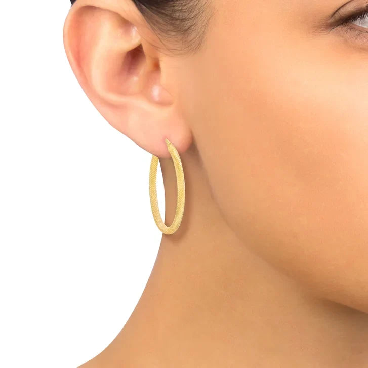 Diamond Cut Oval Hoop Earrings in Yellow Gold