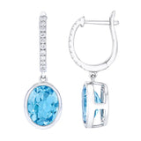 Oval Cut Swiss Blue Topaz and Diamond Earrings (0.16 ctw)